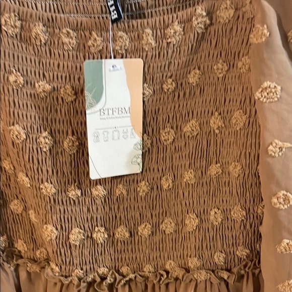 Elegant Long Sleeve Smocked Dress in Brown - Picture 6 of 11